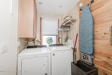 Welcome to this well-maintained three-family home in the highly - photo 25