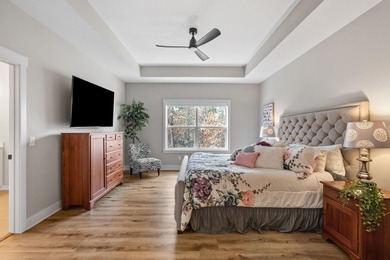 Luxury, low-maintenance living meets peaceful wooded privacy in - photo 26