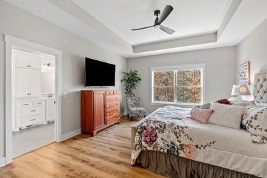 Luxury, low-maintenance living meets peaceful wooded privacy in - photo 27