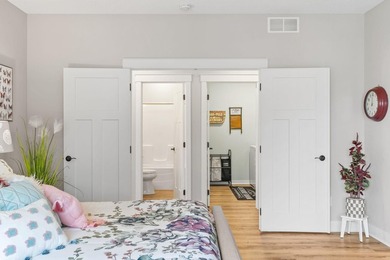 Luxury, low-maintenance living meets peaceful wooded privacy in - photo 30