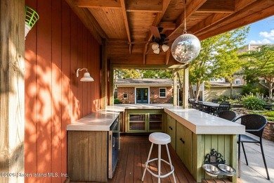 Welcome to this well-maintained three-family home in the highly - photo 32