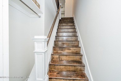 Welcome to this well-maintained three-family home in the highly - photo 33
