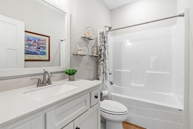 Luxury, low-maintenance living meets peaceful wooded privacy in - photo 36