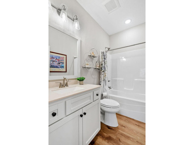 Luxury, low-maintenance living meets peaceful wooded privacy in - photo 37