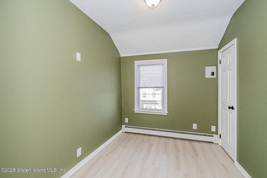 Welcome to this well-maintained three-family home in the highly - photo 38