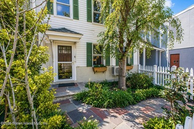 Welcome to this well-maintained three-family home in the highly - photo 42