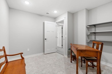 Luxury, low-maintenance living meets peaceful wooded privacy in - photo 49