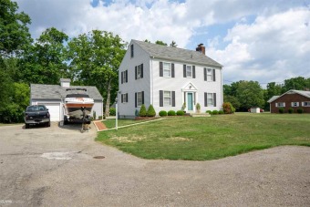 Clinton River Home For Sale in Macomb Michigan