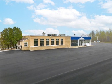 This versatile commercial property offers 350 feet of road