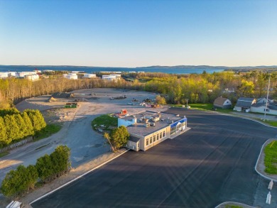 This versatile commercial property offers 350 feet of road