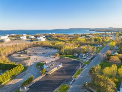 This versatile commercial property offers 350 feet of road