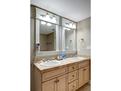 THIS BEAUTIFUL CORNER UNIT HAS BOTH BAY AND RESORT VIEWS! - photo 18