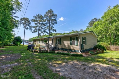 Lake Sinclair home with a large view, max dock, single boathouse - Lake Home Off Market in Eatonton, Georgia