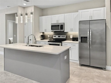 Built in 2023, this true 4-bedroom, 2-bath home with a two-car - photo 4