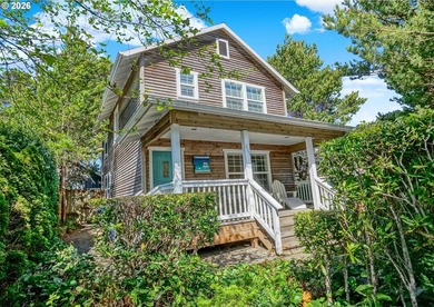 Enjoy the coastal lifestyle in this charming cottage home in the - photo 1