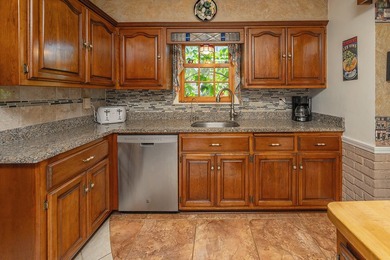 Your'e gonna love this handsome brick colonial nestled on a - photo 16
