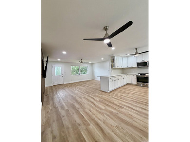 This updated 4-bed, 2-bath home in the highly desired Lake - photo 1