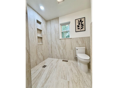 This updated 4-bed, 2-bath home in the highly desired Lake - photo 5