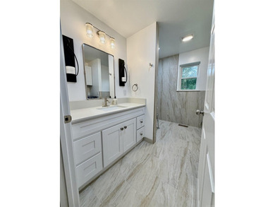 This updated 4-bed, 2-bath home in the highly desired Lake - photo 6