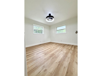This updated 4-bed, 2-bath home in the highly desired Lake - photo 7