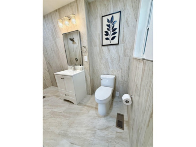 This updated 4-bed, 2-bath home in the highly desired Lake - photo 8