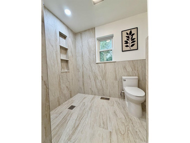 This updated 4-bed, 2-bath home in the highly desired Lake - photo 9