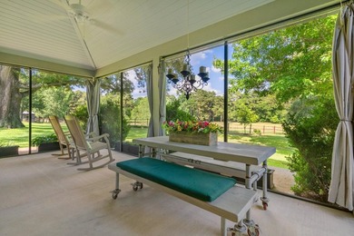 A serene 12 acres of lush pastureland and mature trees, this - photo 24