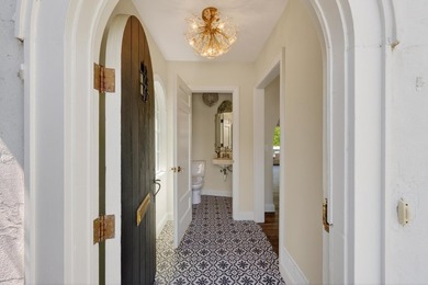 Beautifully updated, embracing its historic character while - photo 7