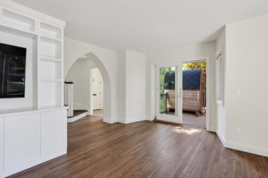 Beautifully updated, embracing its historic character while - photo 9