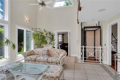 Welcome to this stunning two-story brick home in the highly