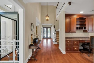 Welcome to this stunning two-story brick home in the highly
