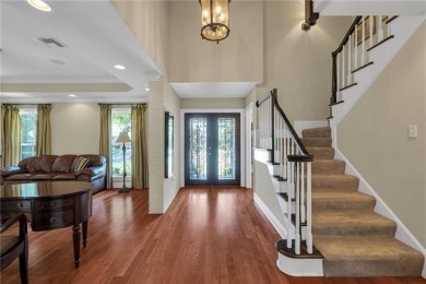 Welcome to this stunning two-story brick home in the highly