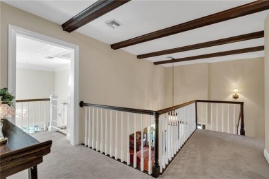 Welcome to this stunning two-story brick home in the highly