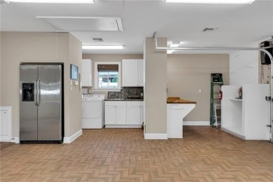 Welcome to this stunning two-story brick home in the highly