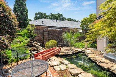 Welcome to this stunning two-story brick home in the highly
