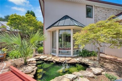 Welcome to this stunning two-story brick home in the highly