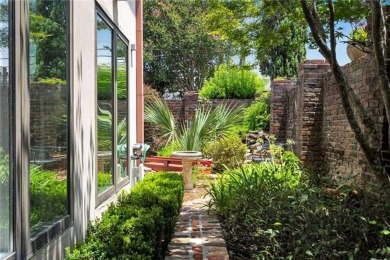 Welcome to this stunning two-story brick home in the highly