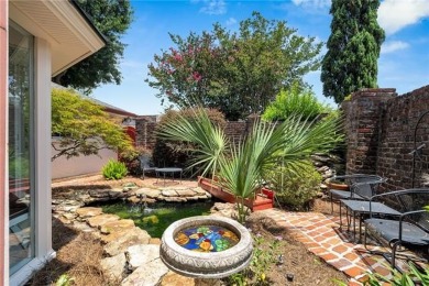 Welcome to this stunning two-story brick home in the highly