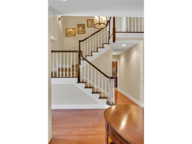 Welcome to this stunning two-story brick home in the highly