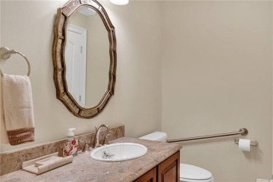 Welcome to this stunning two-story brick home in the highly