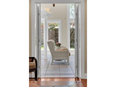 Welcome to this stunning two-story brick home in the highly