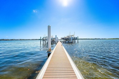 Experience the pinnacle of coastal living in this stunning - photo 2
