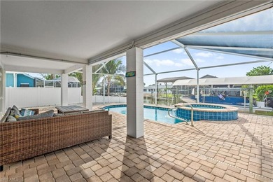 Welcome to your coastal paradise! This ELEVATED canal home with - photo 7