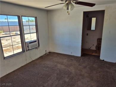 Fixer Upper with Huge Potential on 1.1 Acres in Pahrump!  Bring