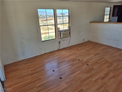Fixer Upper with Huge Potential on 1.1 Acres in Pahrump!  Bring