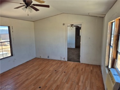 Fixer Upper with Huge Potential on 1.1 Acres in Pahrump!  Bring
