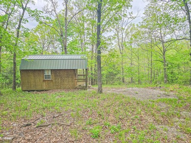 Tiny price. Big lake energy. Just a stone's throw from Lake of - photo 2