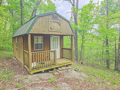 Tiny price. Big lake energy. Just a stone's throw from Lake of - photo 3