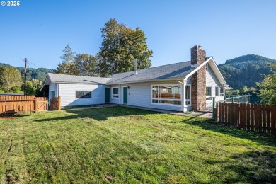 Lake Home For Sale in Scottsburg, Oregon