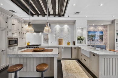 Beautifully renovated and spanning approximately 2,000 square - photo 2